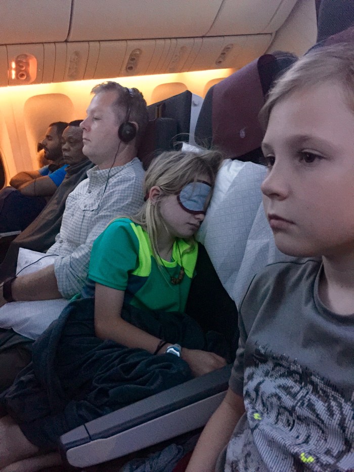 Ruby trying to sleep on plane